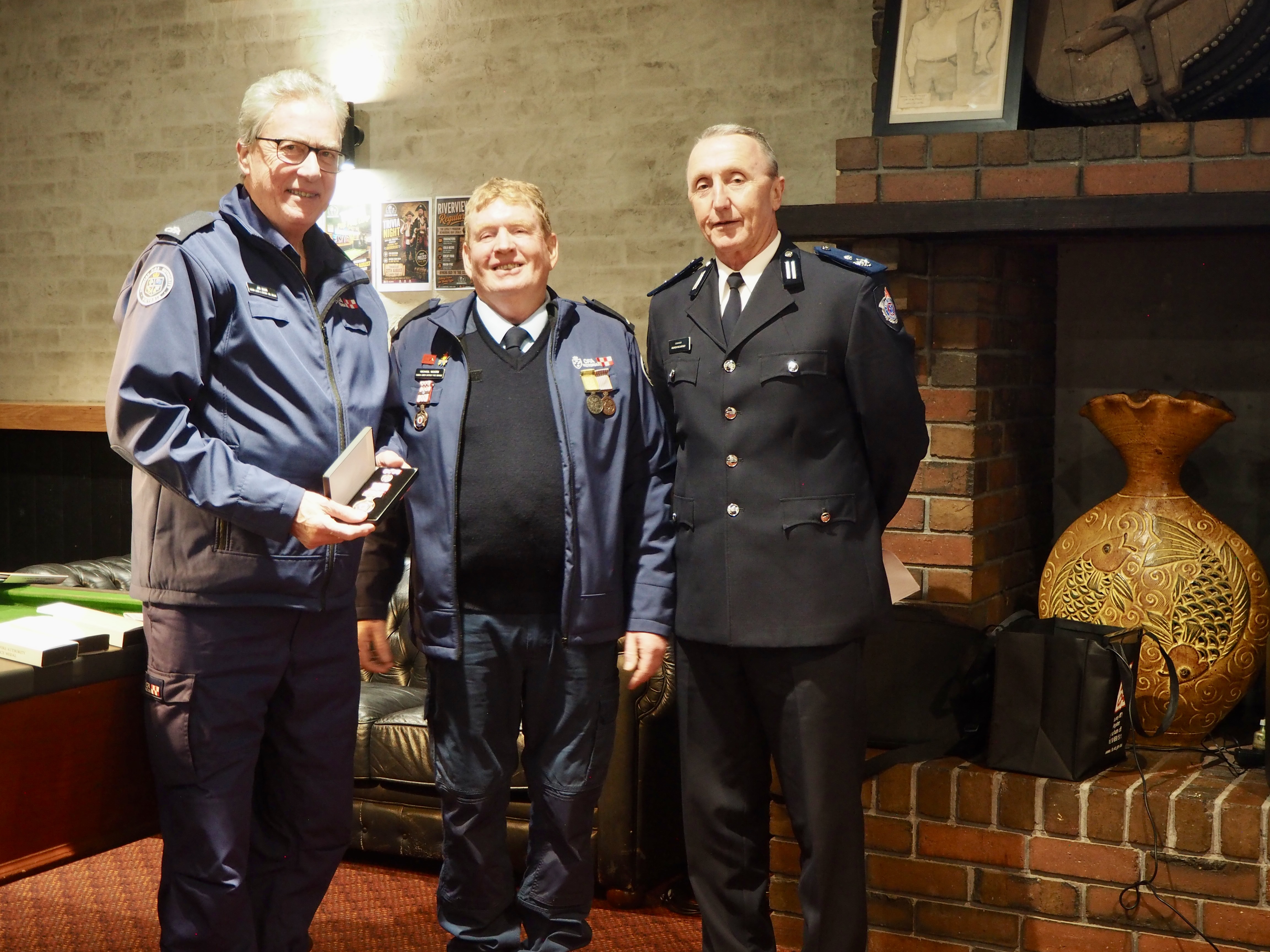 Tarwin Lower & District&rsquo;s immediate past-treasurer Jim Barr was presented with his 15-year service medal by Captain Mick Moore and District 9 Commander Andrew McCartney.